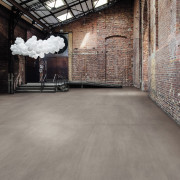 Empty warehouse with cloud made of balloons